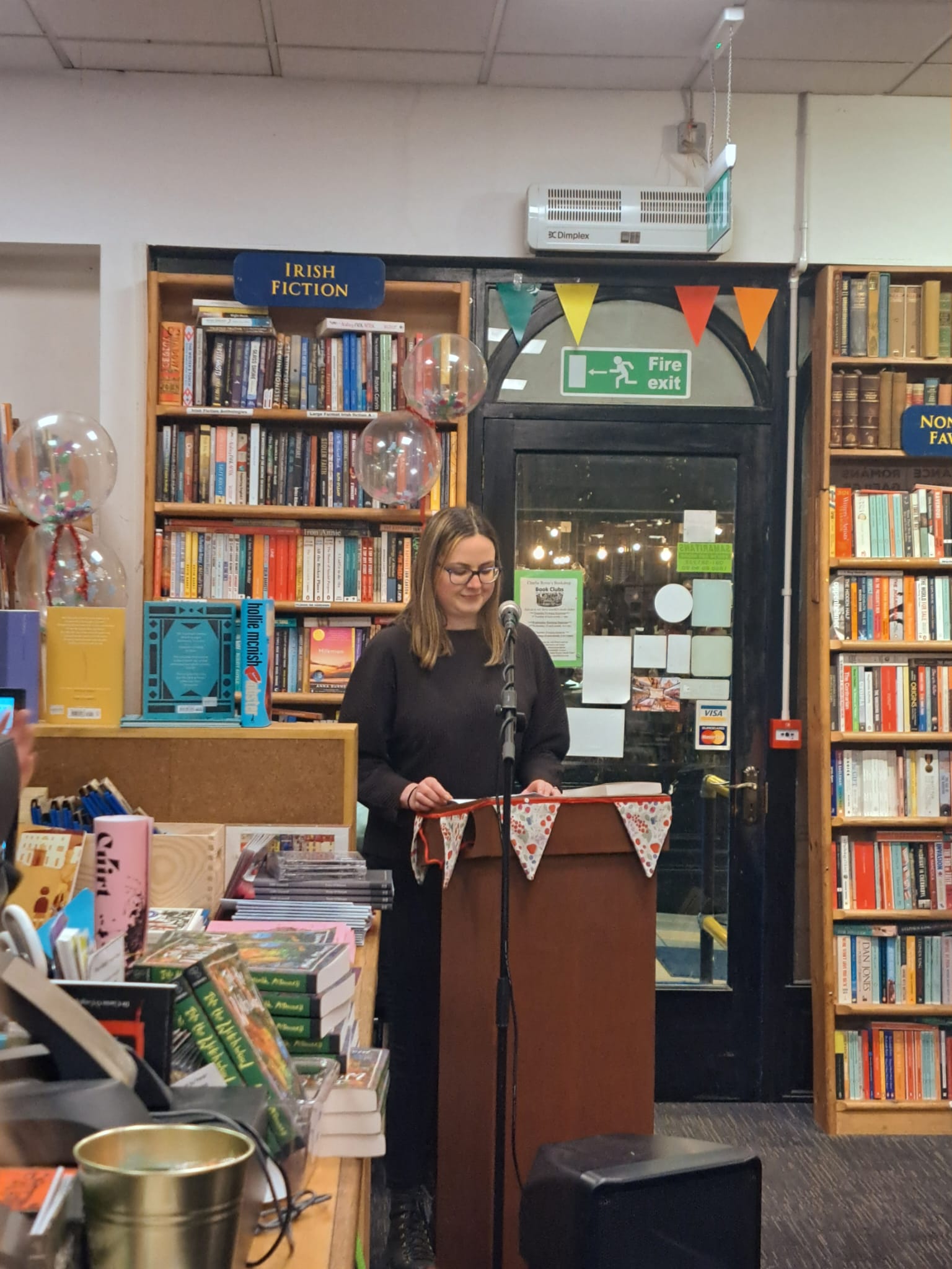 Grainne O'Brien presenting the book